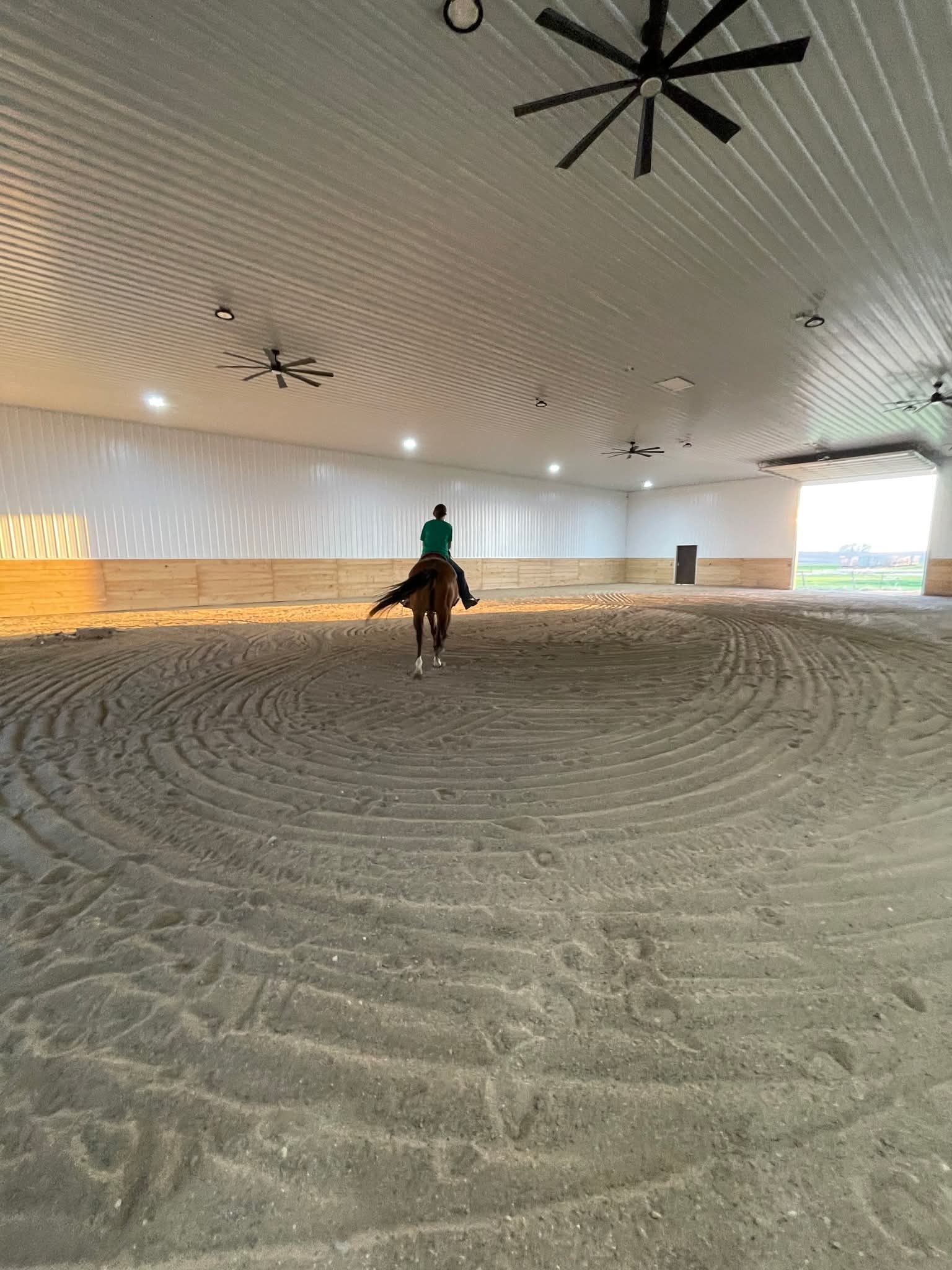 Wide view of the indoor riding arena